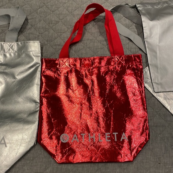 Five Athleta bags: 2 large silver, 1 med metallic red & 2 mix size metallic bags - Picture 3 of 4